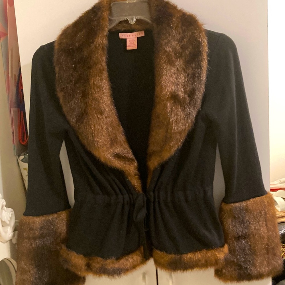 The name in this Tina Hagen, black with fake fur collar and sleeves